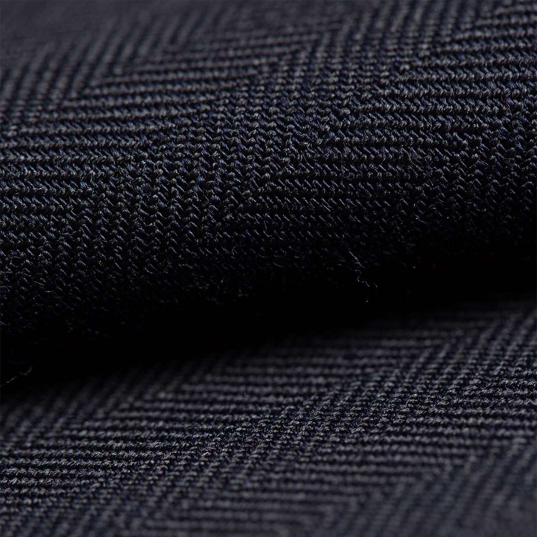 A classic navy blue herringbone cloth